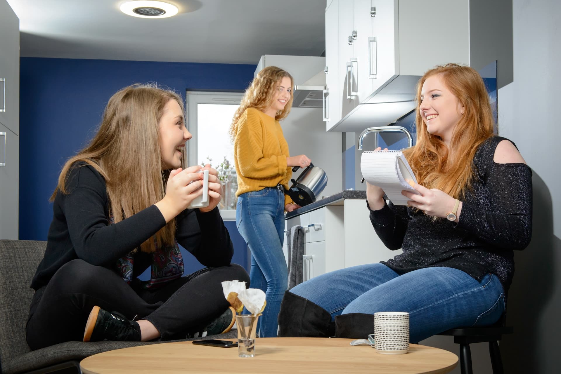 Students in the kitchen of Westfield Court, student accommodation in Hull