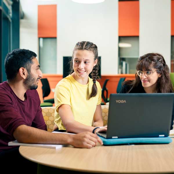 Students on the collaboration deck in the Allam Medical Building