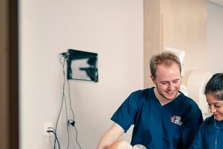 Medical students with SIM patient simulator