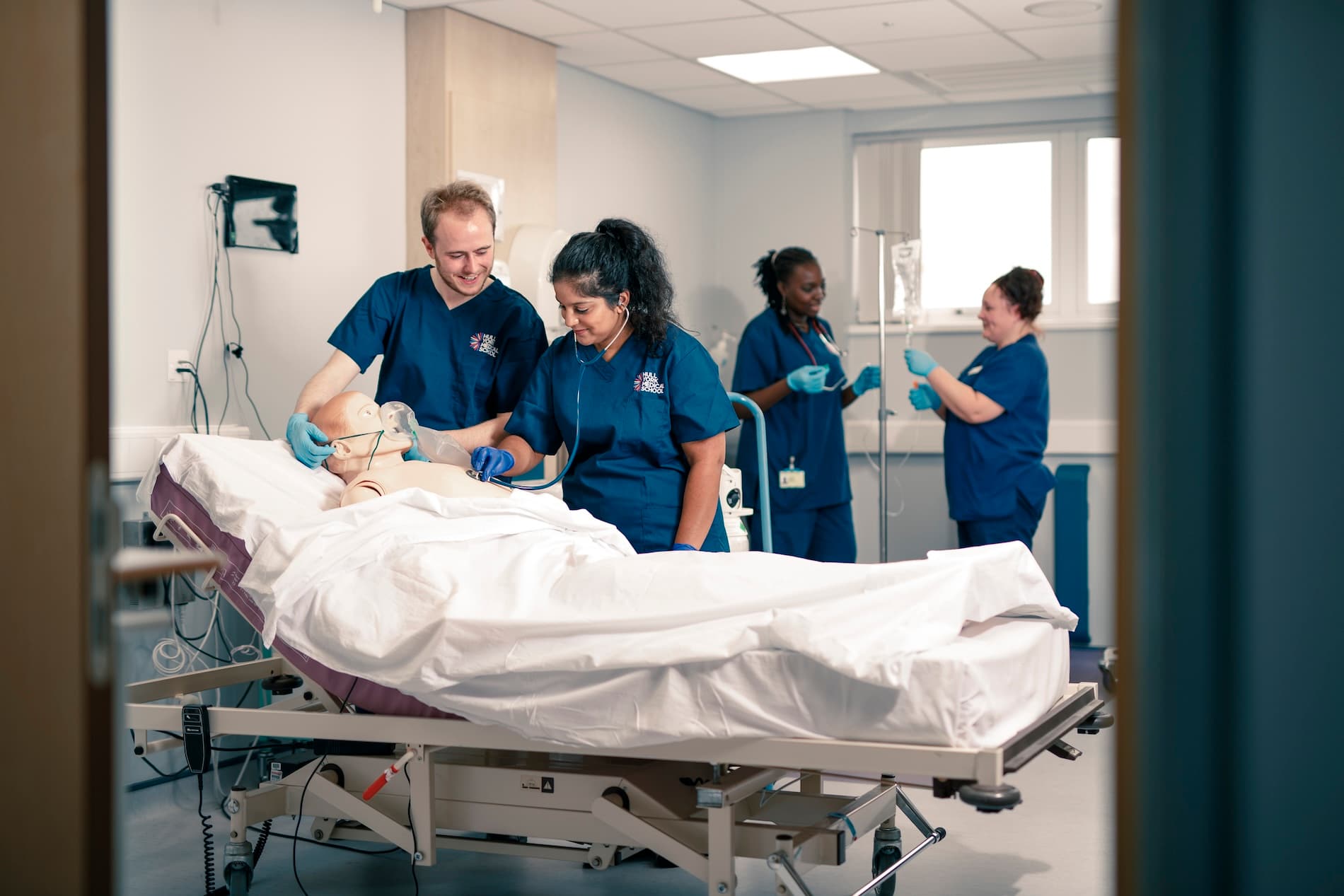 Medical students with SIM patient simulator