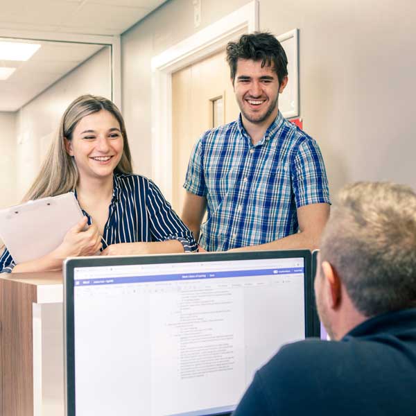 Students chatting to a member of the Student Liaison Team at Hull Royal Infirmary