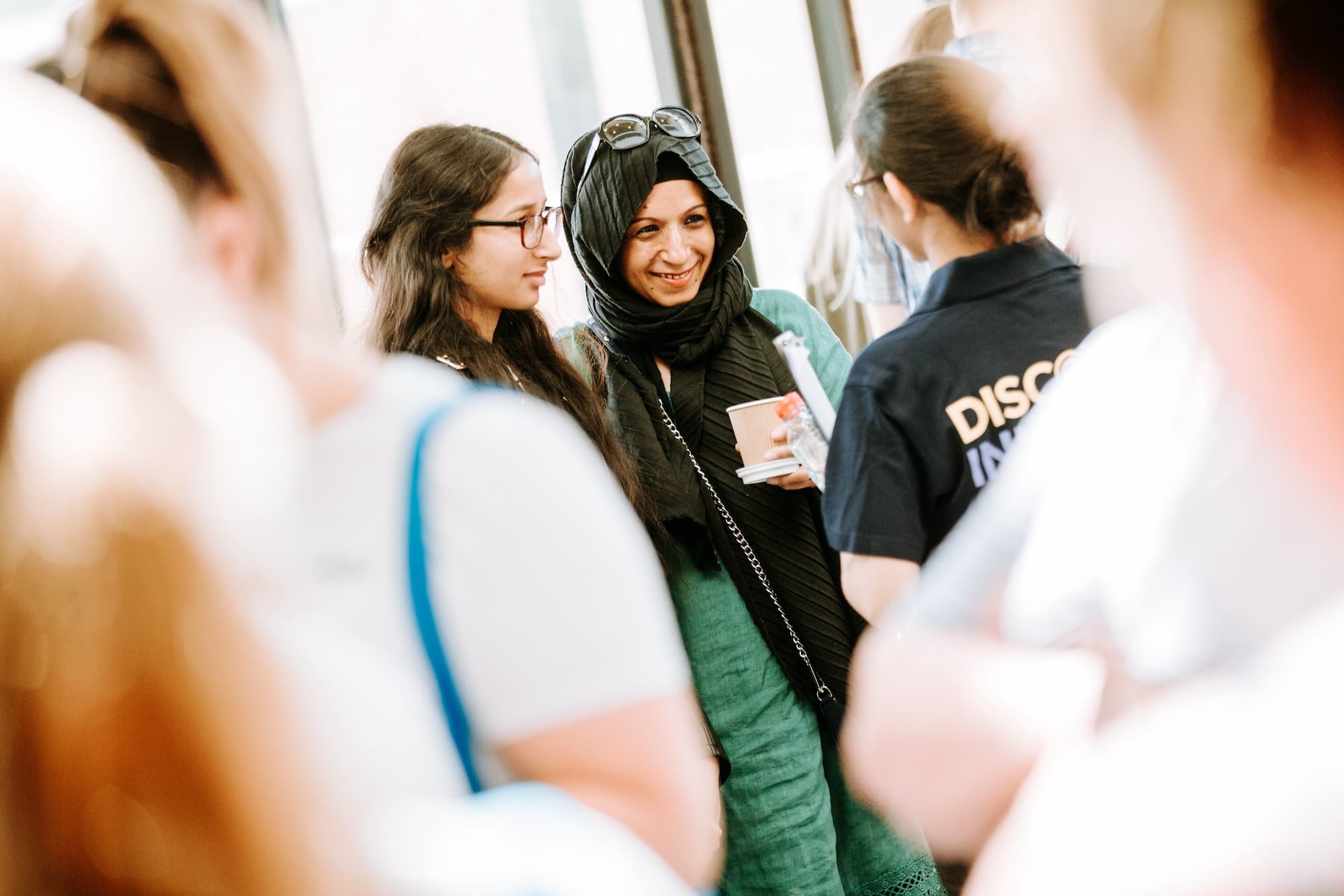 Visitors talking with a Medicine student ambassador