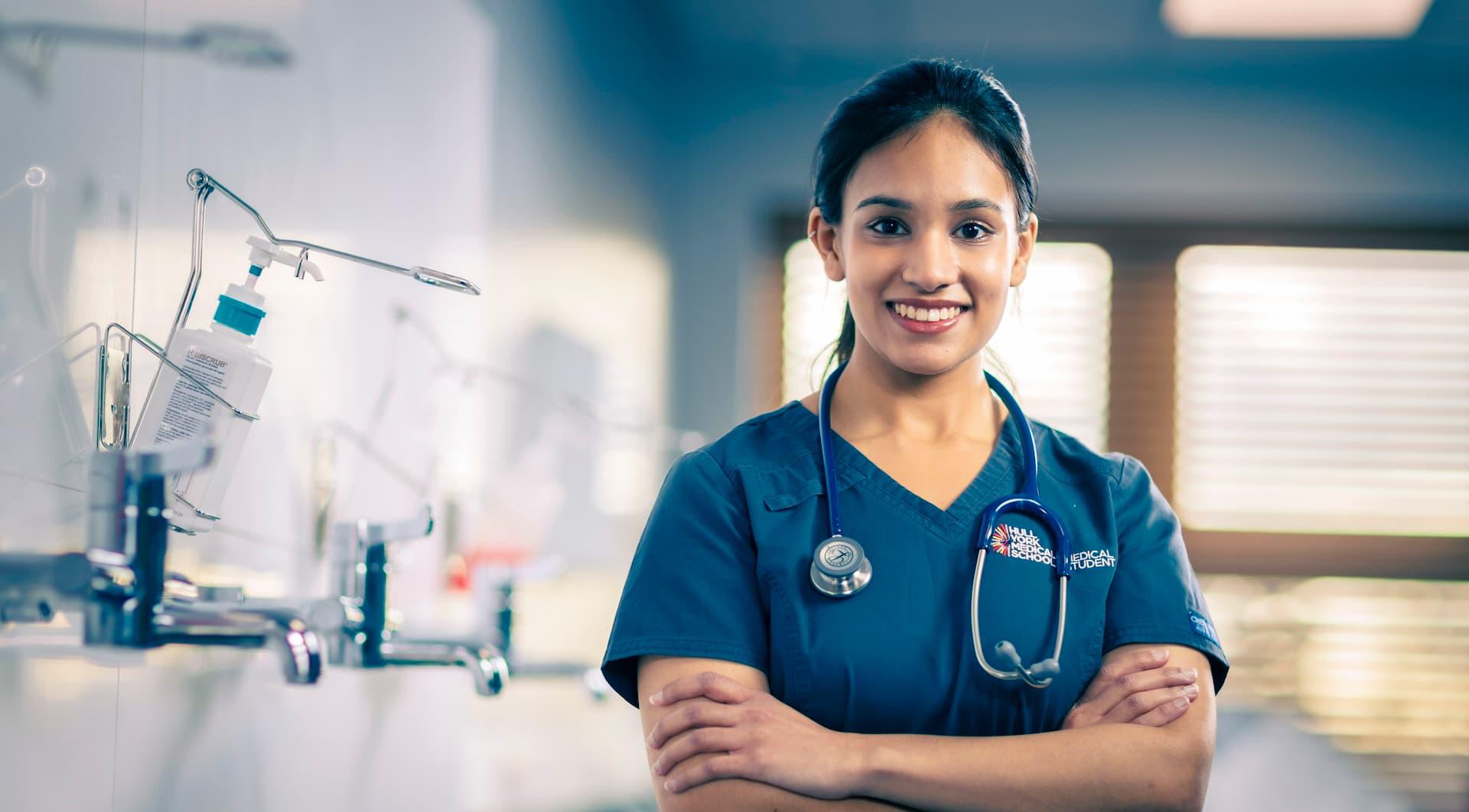 Medicine student Aditi Goyal smiling on a hospital ward