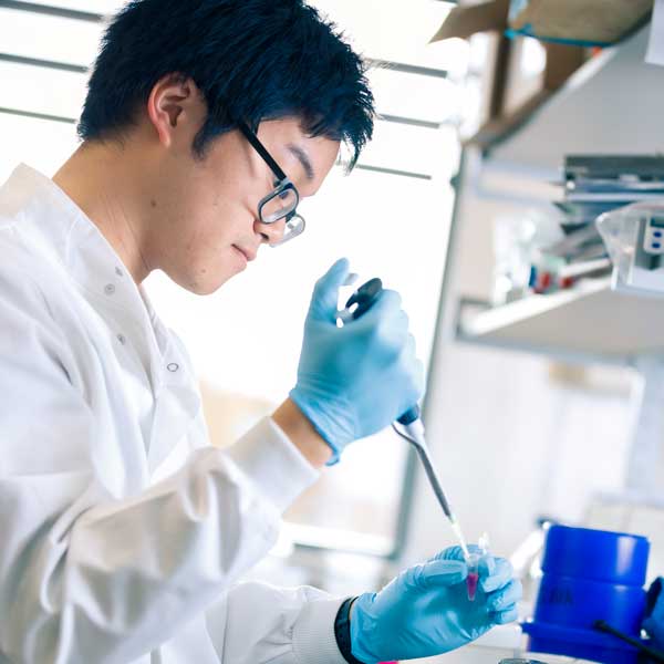 Student in lab conducting experiments