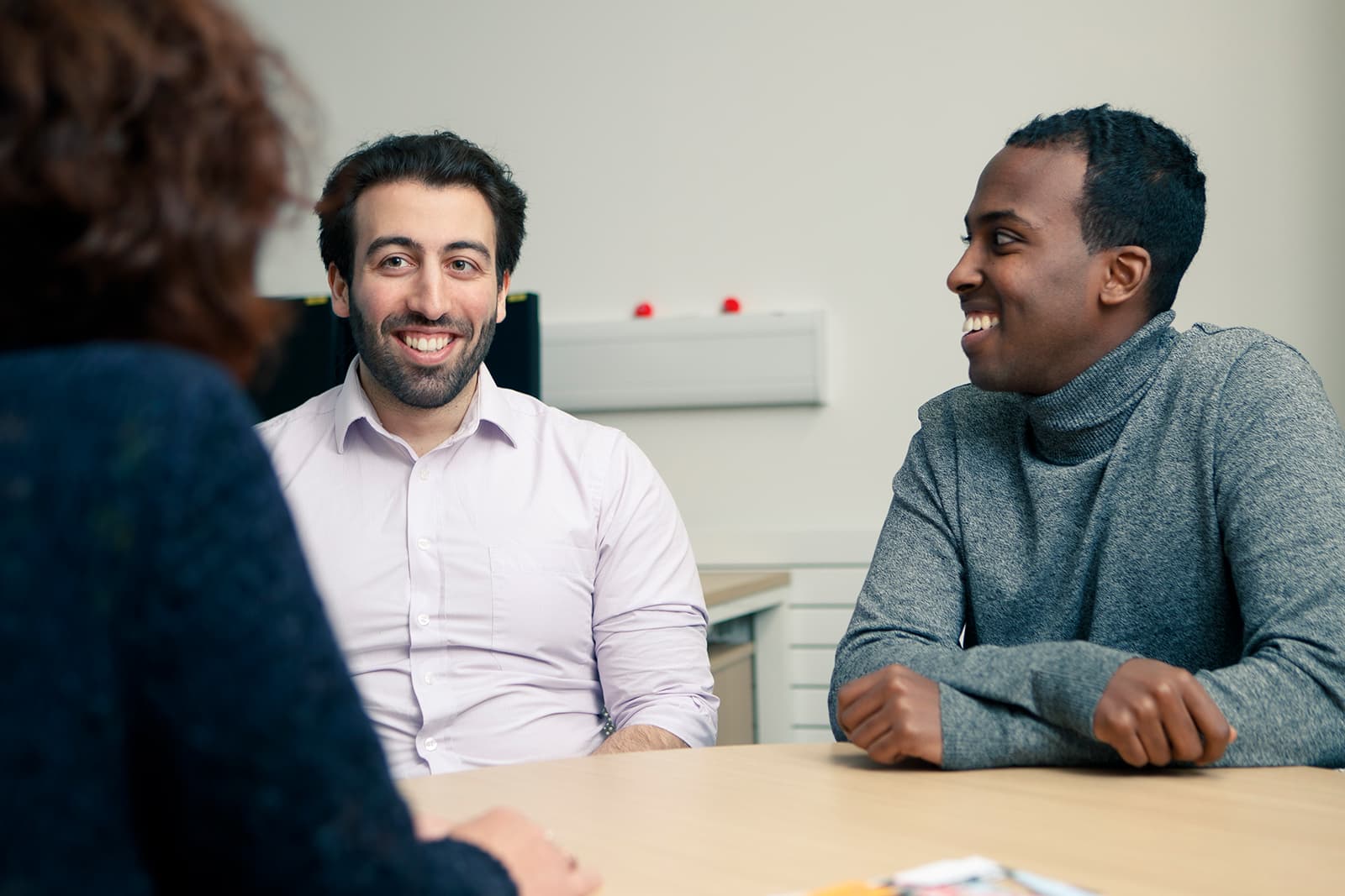 Students talking to a member of the Student Support Team