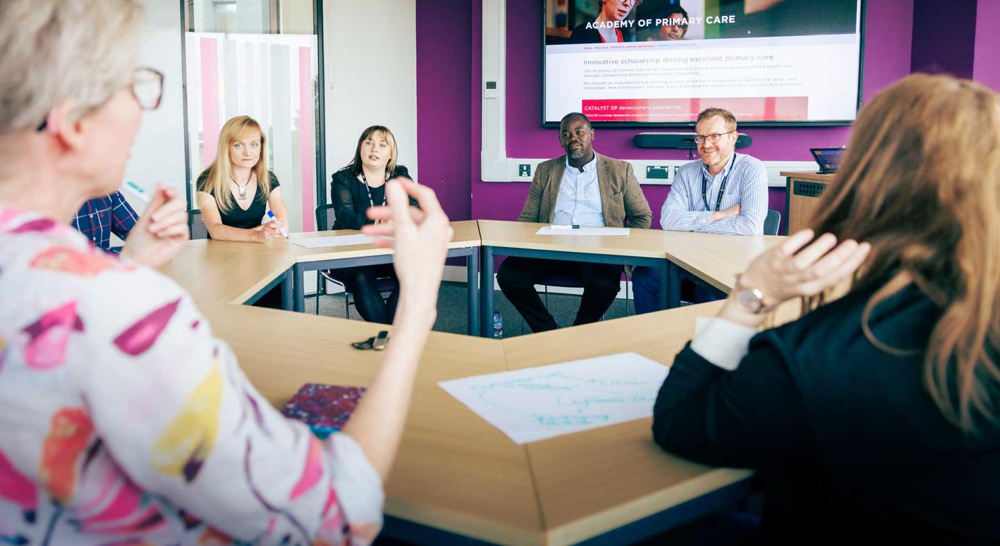 Members of the Academy of Primary Care in a meeting
