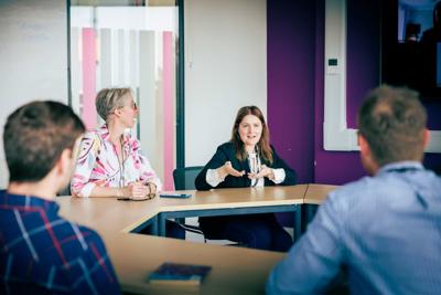 Members of the Academy of Primary Care in a meeting